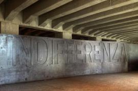 The word "indifference" in  Milan’s central station
