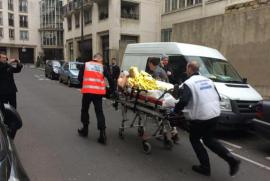 A coworker of "Charlie Hebdo" taken away by ambulance nurses