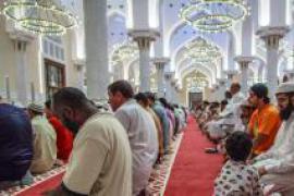 Muslim faithfuls praying for peace
