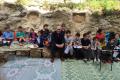 Gabriele Nissim with the children of Neve Shalom
